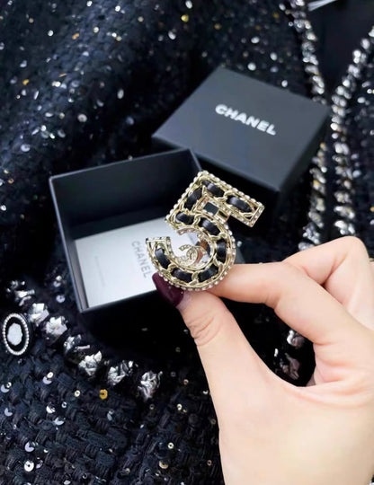 Chanel leather and metal number 5 ring