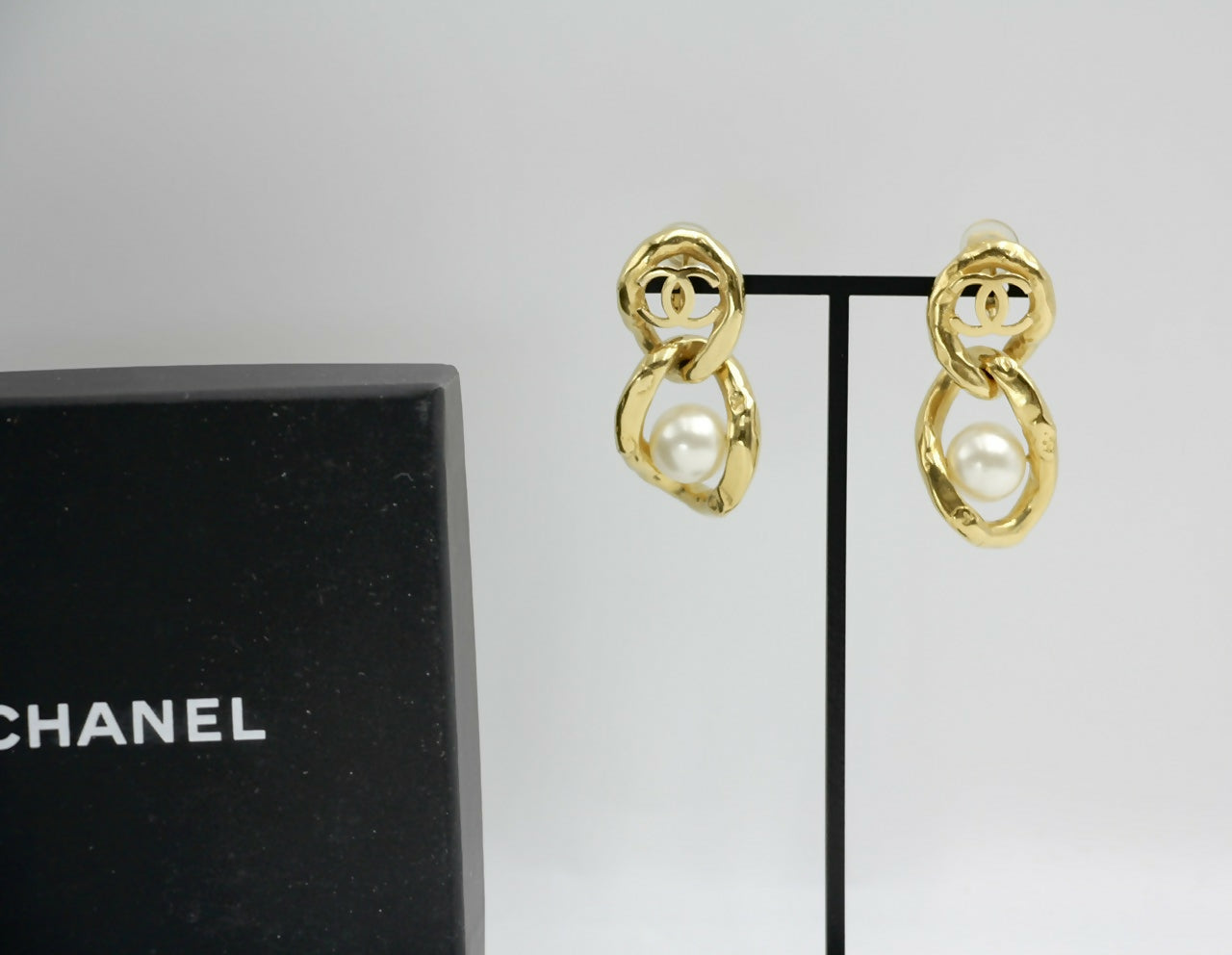 Chanel L20C Imitation Pearl Figure Eight Two-Buckle Lock Earrings