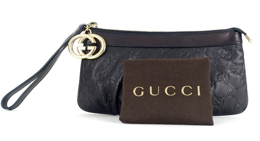 Gucci Sukey Monogram Leather GG Charm Wristlet Bag