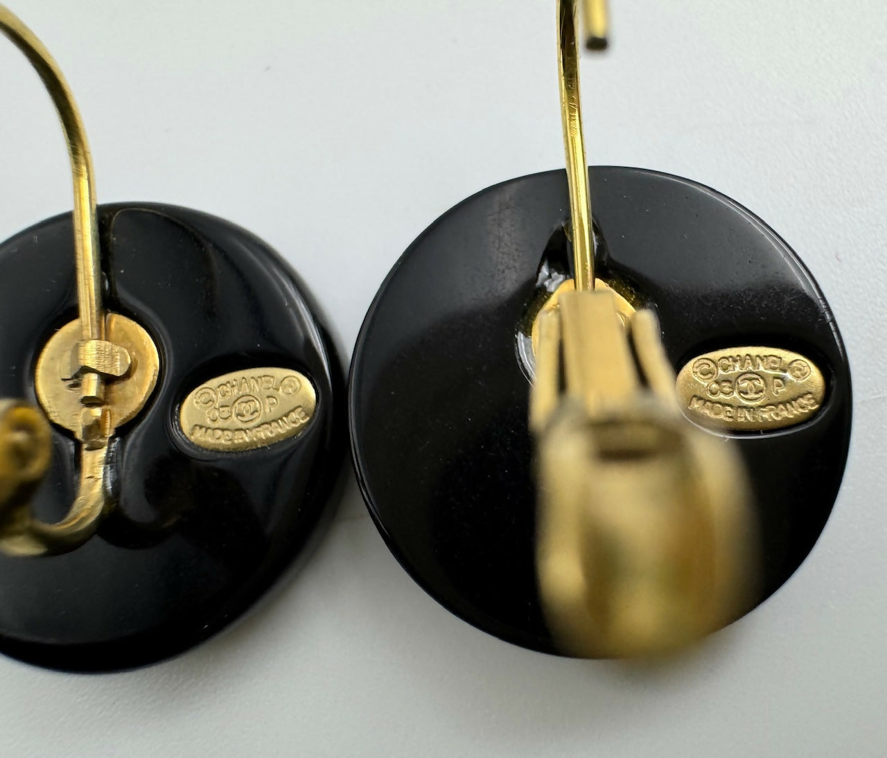 Chanel Vintage 03P Resin Black and White Camellia Button Hoop Earrings