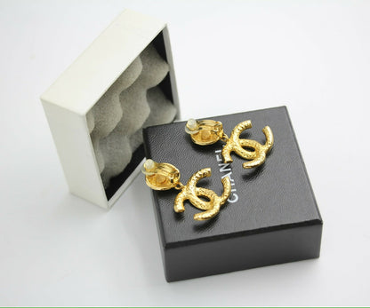 Chanel Vintage 95A Gold-plated Carved Dangle Clip-on Earrings