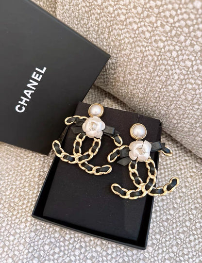Chanel Black Bow With Camellia Round Earrings