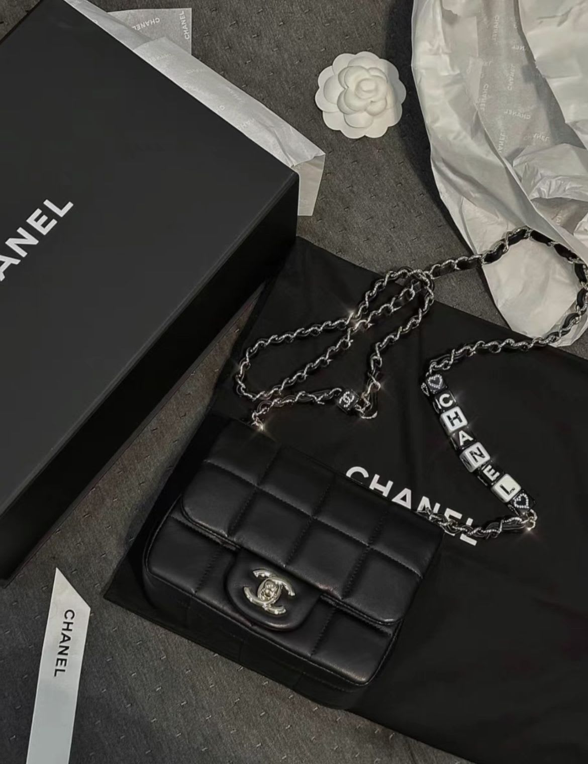 Chanel 23 early spring black letter dice chain bag