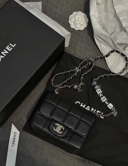 Chanel 23 early spring black letter dice chain bag