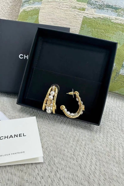 Chanel 23P gold pearl earrings