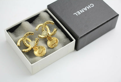 Chanel Vintage 95A Gold-plated Carved Dangle Clip-on Earrings