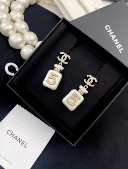 Chanel 22S No. 5 White Perfume Bottle Pendant Diamond Double C Earrings