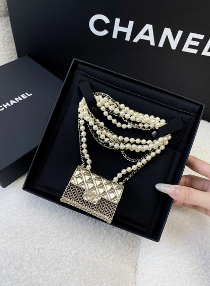 CHANEL 21S RUNWAY MICRO BAG & PEARLS LONG NECKLACE