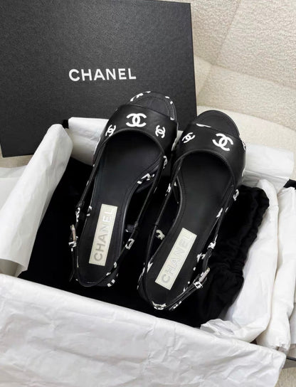 Chanel 22S  Black and White Double C Full Logo Slingback sandals